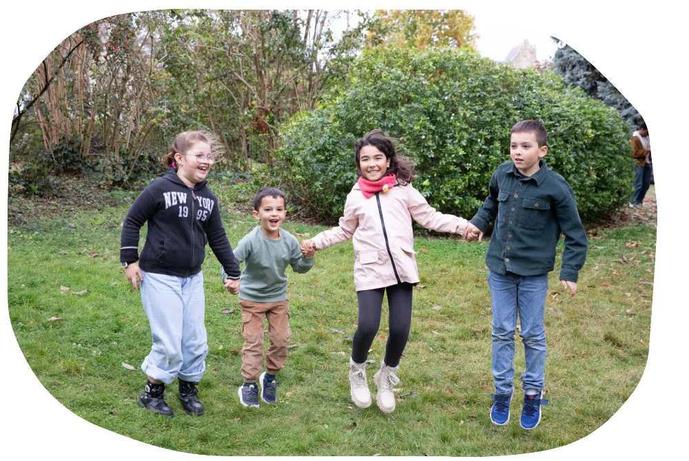 A child wearing Syde device on the ankle and wrist playing with friends